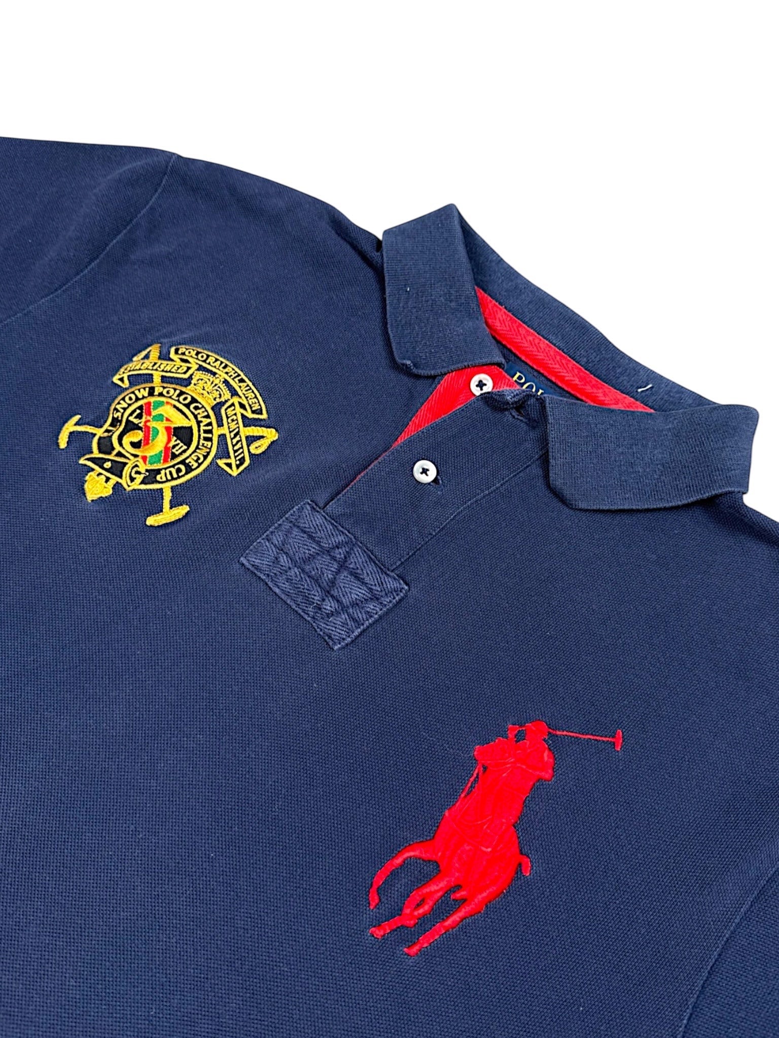 XTENDED Vintage navy blue cotton polo shirt with red embroidered Ralph Lauren polo player and crest.