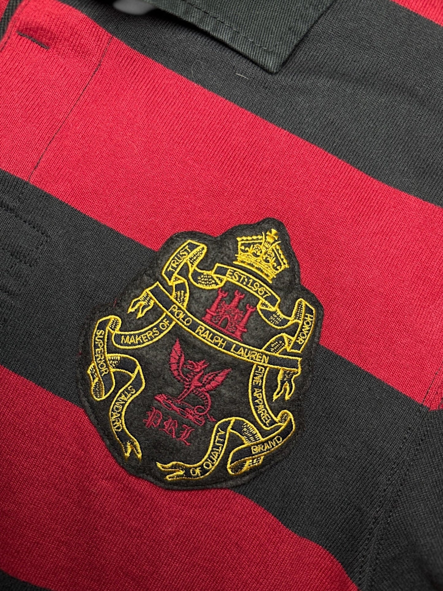 XTENDED Vintage Ralph Lauren long sleeve polo shirt with red and black stripes and embroidered crest.