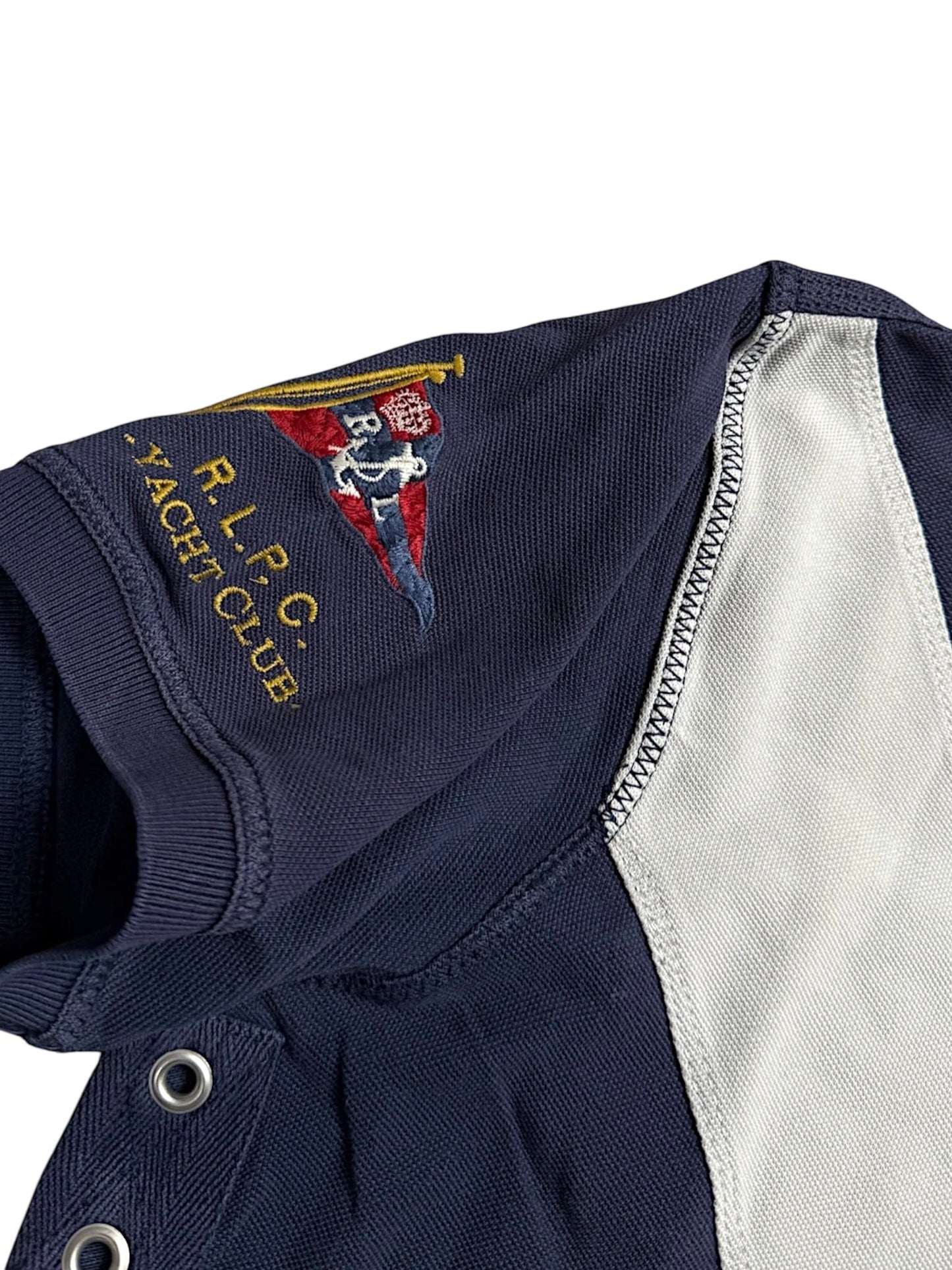 XTENDED Vintage Ralph Lauren navy blue polo shirt with R.L.P.C. Yacht Club embroidery and grey paneling.