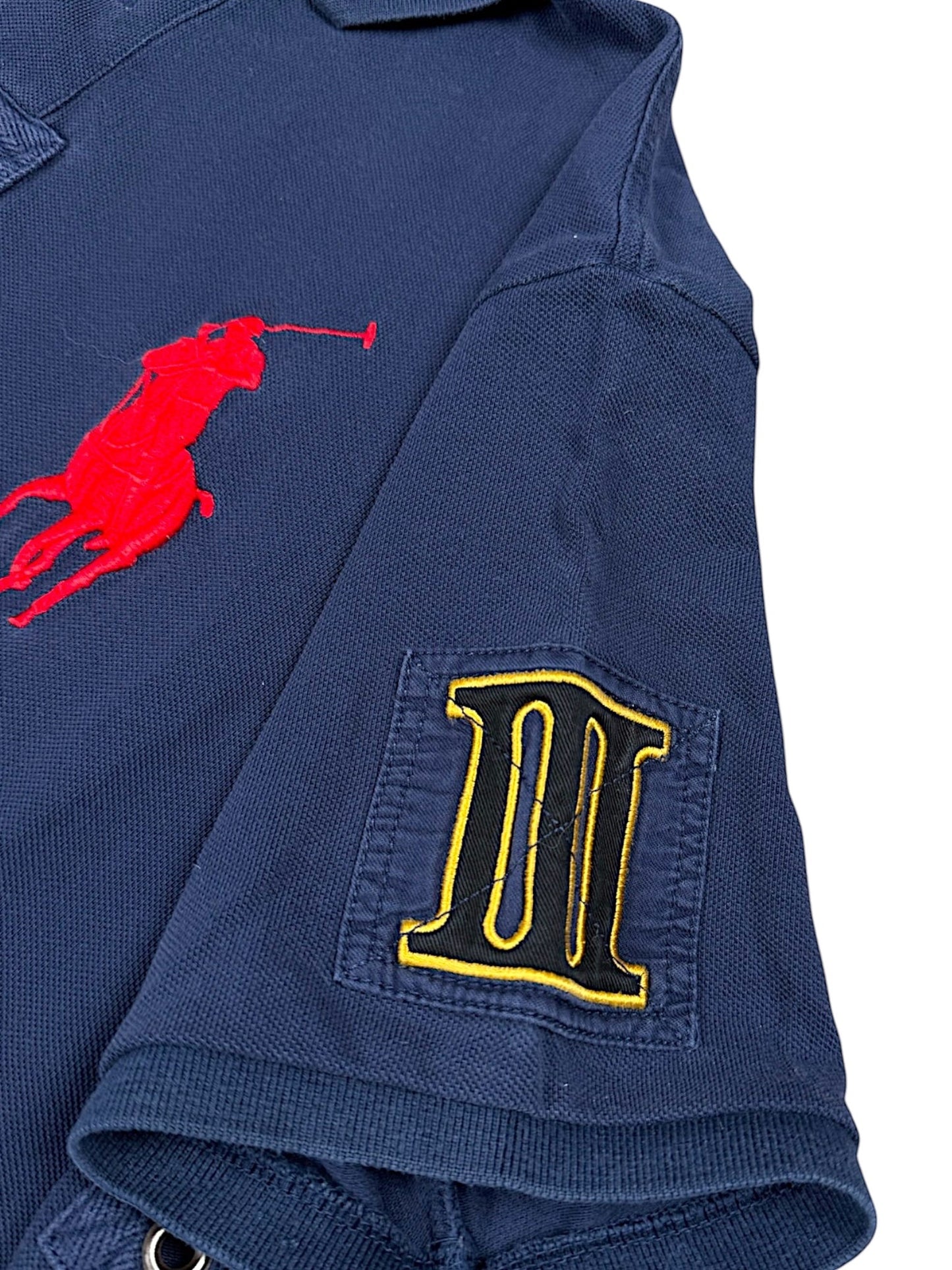 XTENDED Vintage Ralph Lauren navy blue cotton polo shirt with red embroidered pony logo and a patch with Roman numeral III.