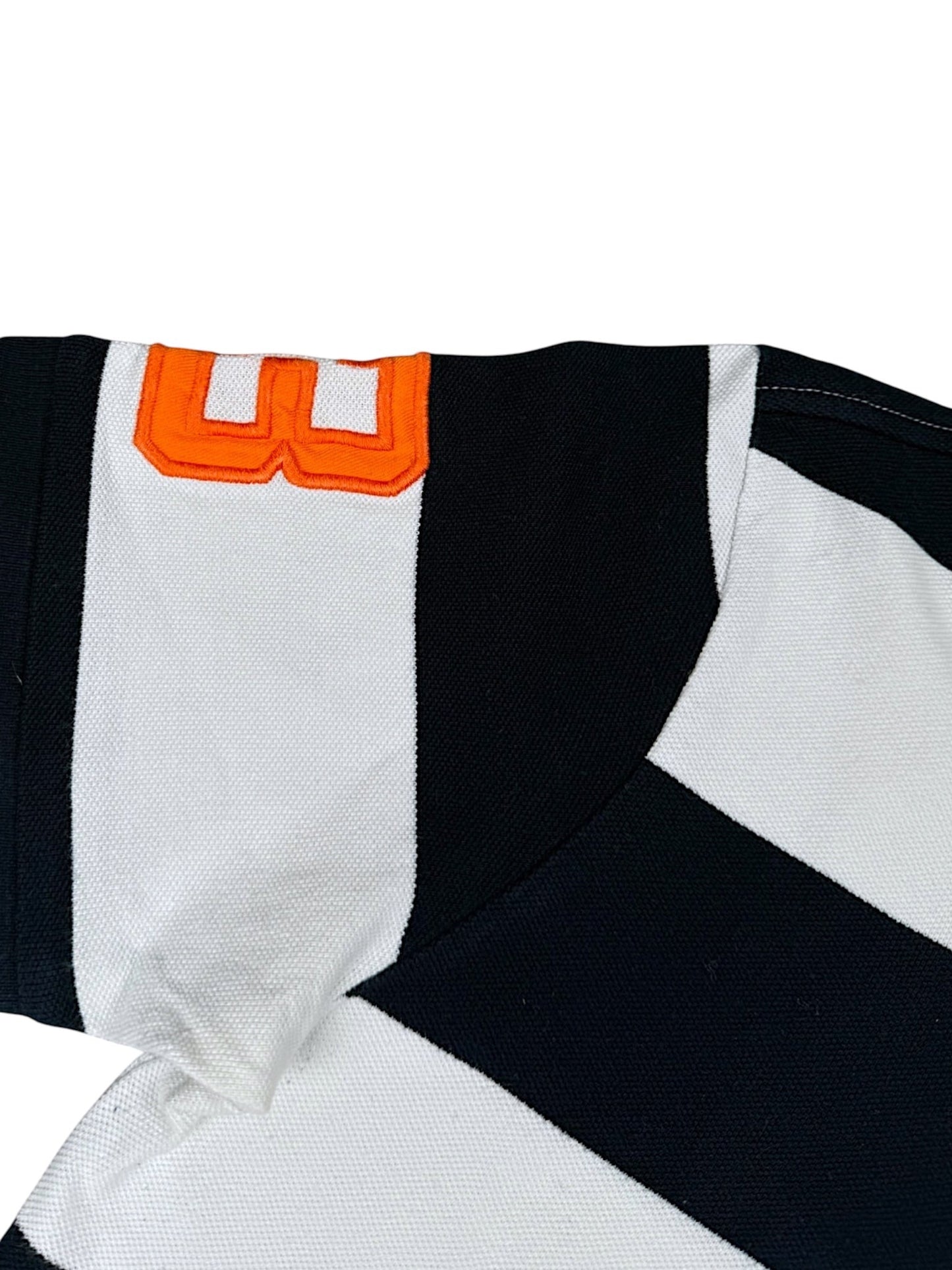 XTENDED vintage Ralph Lauren polo shirt with black and white stripes and orange embroidered number 00 on the chest.