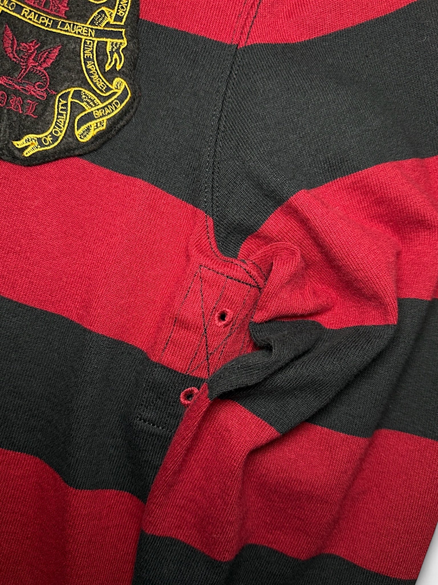 XTENDED Vintage Ralph Lauren long sleeve polo shirt with red and black stripes and embroidered crest.