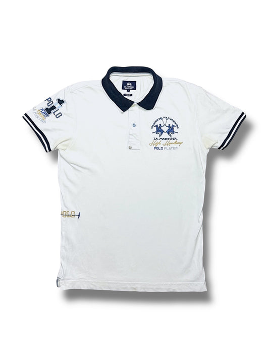 XTENDED vintage white cotton polo shirt with navy collar and cuffs, featuring embroidered polo player graphics and La Martina branding.